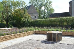 Views of nature on the terrace with fountain and the garden from break-out room Texture