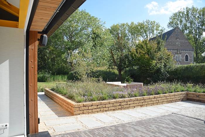 View on the terrace and the garden from break-out room Texture